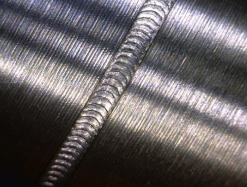 Continuous optical fiber welding